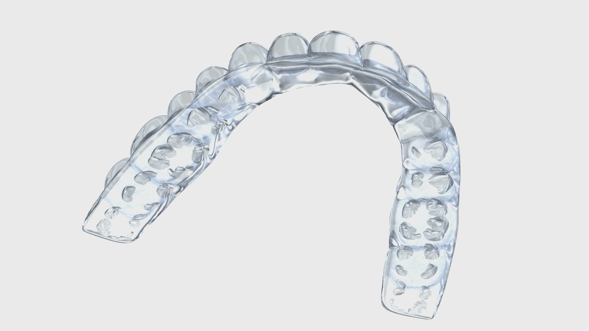 3D showcase video of Snap Custom Nightguard's  Daytime teeth grinding guard. The video provides a rotating view of the transparent, custom-fitted dental guard, highlighting its sleek design and snug fit for maximum teeth protection. The guard is designed for individuals suffering from teeth grinding or bruxism, offering a clear, discreet solution for nighttime use.