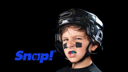 Baseball Player wearing Snaps Custom Mouthguard with personalized design. Snap Logo in blue next to his face with black background and kid is wearing black football heltmet and black gear - Snap Custom Nightguards